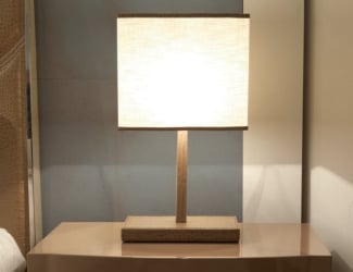 &lt;p&gt;
	Colette Italian designer table lamp shown in a drop lead glass crystal shaped base. Golden leaf in 24kt encloses crystal base.&nbsp; Lamp shade composed in hand made fabric. Lampshade options: black with gold internal part or cream color. The elegant uniqueness creates a sophisticated touch and harmonious environment. Made in Italy.&lt;/p&gt;
