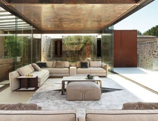 Twiga modern Italian luxury designer sofa is shown in beige colored weavings made of synthetic resin with seat upholstered beige fabric. The structure is composed of beige or brown synthetic resin and the seat cushion is upholstered in fabic. A wide selection of fabrics are available to choose from (samples available upon request). This collection features the finest products by combining materials and shapes that connect with one another, culminating in an exquisite lifestyle. Decorative cushions are not included. Twiga collection is available in chaise lounge, armchair, accent table, and coffee table versions. PVC cover available as an add on. Made in Italy.