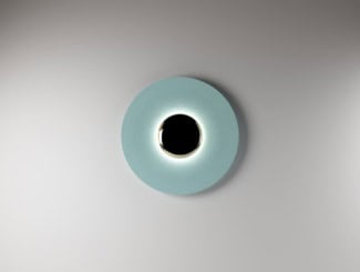 &lt;p&gt;Mono wall light shown in white Carrara marble. Finishes available in aluminum and copper. Wall light features a Carrara marble face with a choice of copper or aluminum ring.  Playful light directed from underneath the surface of the element. Made in Italy.&lt;/p&gt;
