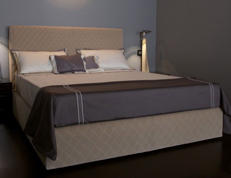 Coco modern Italian storage bed with beige leather