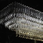 Rectangular glass chandelier with tiered crystal prisms