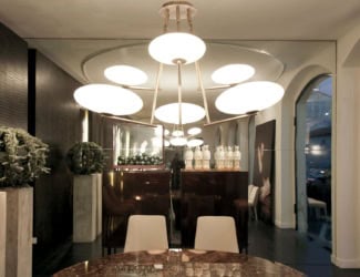 &lt;p&gt;Moon modern Italian designer hanging light shown in bronze resin. Lamp blends perfectly in any living space. Collection diffuses a light that welcomes in any environment. Made in Italy.&lt;/p&gt;
