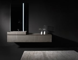 &lt;p&gt;Puro 101 contemporary Italian modular bathroom vanity shown in Medea marble 88.5&#8243; base with a grey marble top. Combining clean geometrical lines enriched by precious metals without limits to functionality. Featuring special worked tops and sides, recessed handles, total width fronts and original finishes including heat-treated oak and stones; all which can be fully tailored and customized. Base/Top finish options: 27 matt or high glossy lacquers, 17 matt veneers, 1 glossy veneer, 4 clays and 10 marbles. Additional top options: 4 synthetic materials. Wash basins options: Semi-inset, Undermounted, Above Counter, Sit-On and integrated sink top. Opening options: Groove handle, 3 handle types or push latch without handle. Modular base widths: 85”, 88.5”, 106.3”, 116.9”, 145.7”. Modular base depths: 15.3”, 18.5”, 21.5”. Modular base heights: 9.4”, 14.3”, 18.1”. Mirrors available in mocha or white with included backlight. Made in Italy.&lt;/p&gt;
