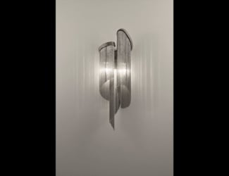 &lt;p&gt;Mono wall light shown in white Carrara marble. Finishes available in aluminum and copper. Wall light features a Carrara marble face with a choice of copper or aluminum ring.  Playful light directed from underneath the surface of the element. Made in Italy.&lt;/p&gt;
