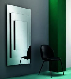 Pixel luxury Italian designer mirror shown in bronze with wood frame. Mirror composed in lacquered wooden frame. Engraved mirror with bronze in the edge and neutral surface in the center. Also available in the fully engraved bronze version upon request. This hand made collection features a vibrant and electrical soul tailored to meet the need of every individual. Traditional furniture created with the finest materials in marble, camouflage wood, and satin. Also available in a showcase version. Made in Italy.