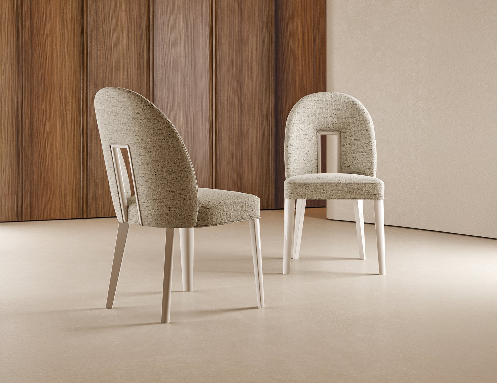 Fabric dining chairs in neutral setting.