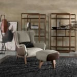 Leather armchair with matching ottoman on rug in living room