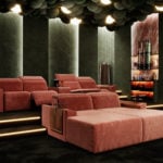 Kubrik modular fabric home theater sofa with recliners in tiered room setting