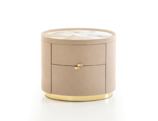 Mondrian luxury Italian bedside table upholstered in white leather. This luxury Italian furniture collection combines high-end materials in wood and metal with fine leather and fabric upholstery. A wide variety of fabrics and leathers are available to choose from (samples available upon request). Shown in white leather with base in printed leather. Base composed of a bronze brass finish. Base finish option: satin steel. The structure can be customized with smooth or nubuck leather upon request. Made in Italy.