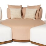Ilario leather sectional sofa with round central seat and wood base