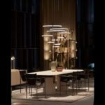 Metal suspension light with multiple circular rings hanging above a dining table