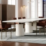 Stone dining table with Vicenza finish in room setting