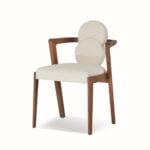 Fabric dining chair with wooden frame and circular backrest