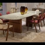 Quartzite dining table with Blue Roma finish and wooden base