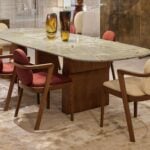 Quartzite dining table with Blue Roma finish and wooden base