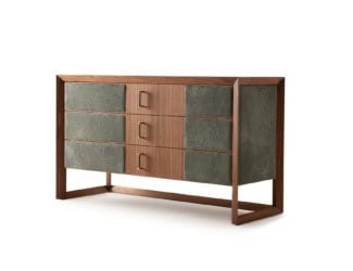 &lt;p&gt;Wynwood luxury Italian designer chest of drawers in solid beech wood tinted smoke grey with base in reinforced metal frame, shown in taupe upholstered leather. Side panels shown with mirror. Side panel options: mirror or leather, available in many options. Back panel composed of multilayer wood, covered in microfiber. Drawers&#8217; front panel in multilayer wood covered in leather. Internal structure with multilayer wood panels covered in beige microfiber and quilted bottom. Opening with shaped handle in solid beech wood and drawer rails with soft closing. A wide variety of fabrics and leathers are available to choose from (samples available upon request). This collection features a combination of classic and contemporary styles adding a sophisticated and unique touch to any atmosphere. Available in bed, daybed, chair, chair with armrests, bedside table, desk, wall lamp, mirror, dining table and standing mirror version. Made in Italy.&lt;/p&gt;
