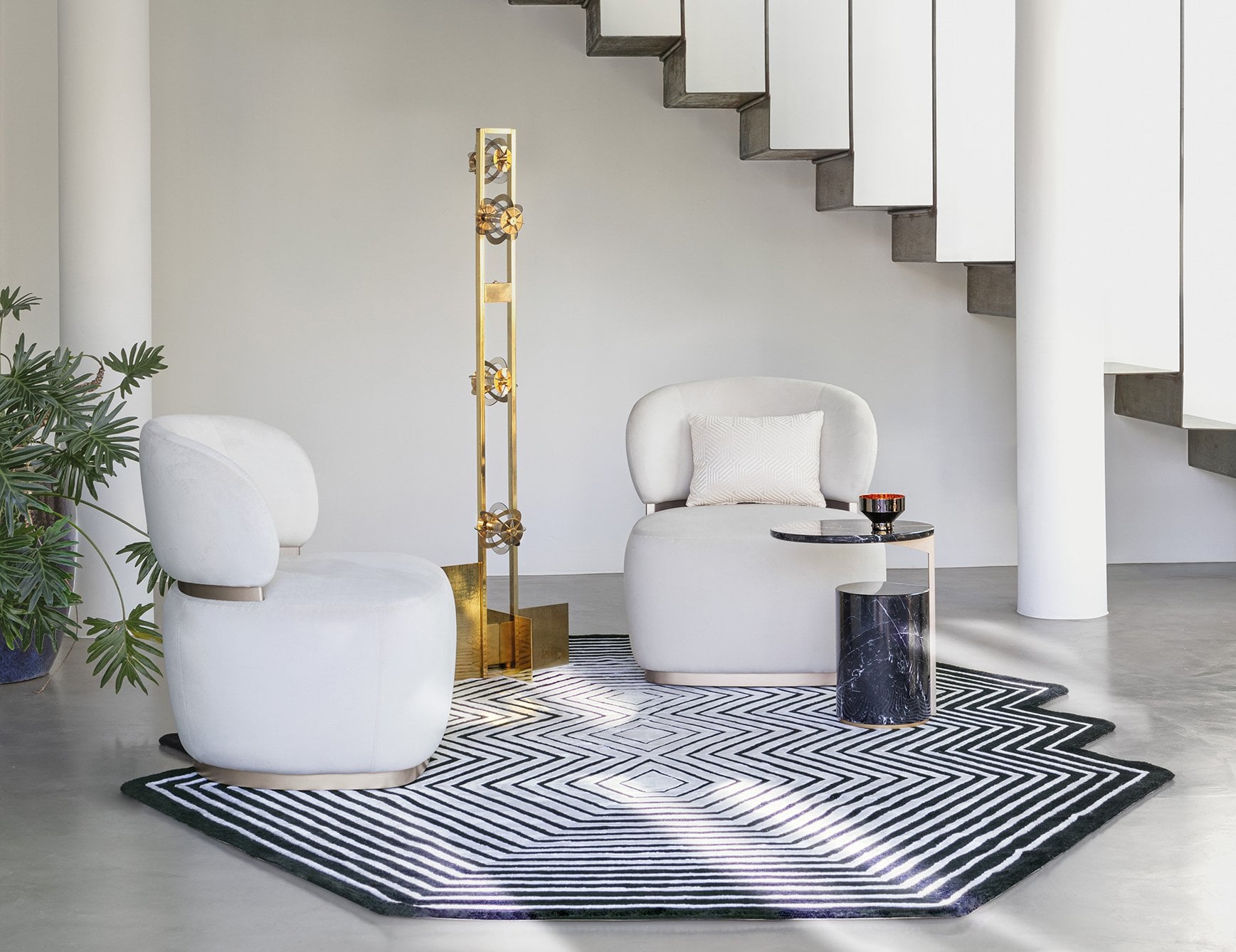 Fabric swivel armchairs in a living room setting
