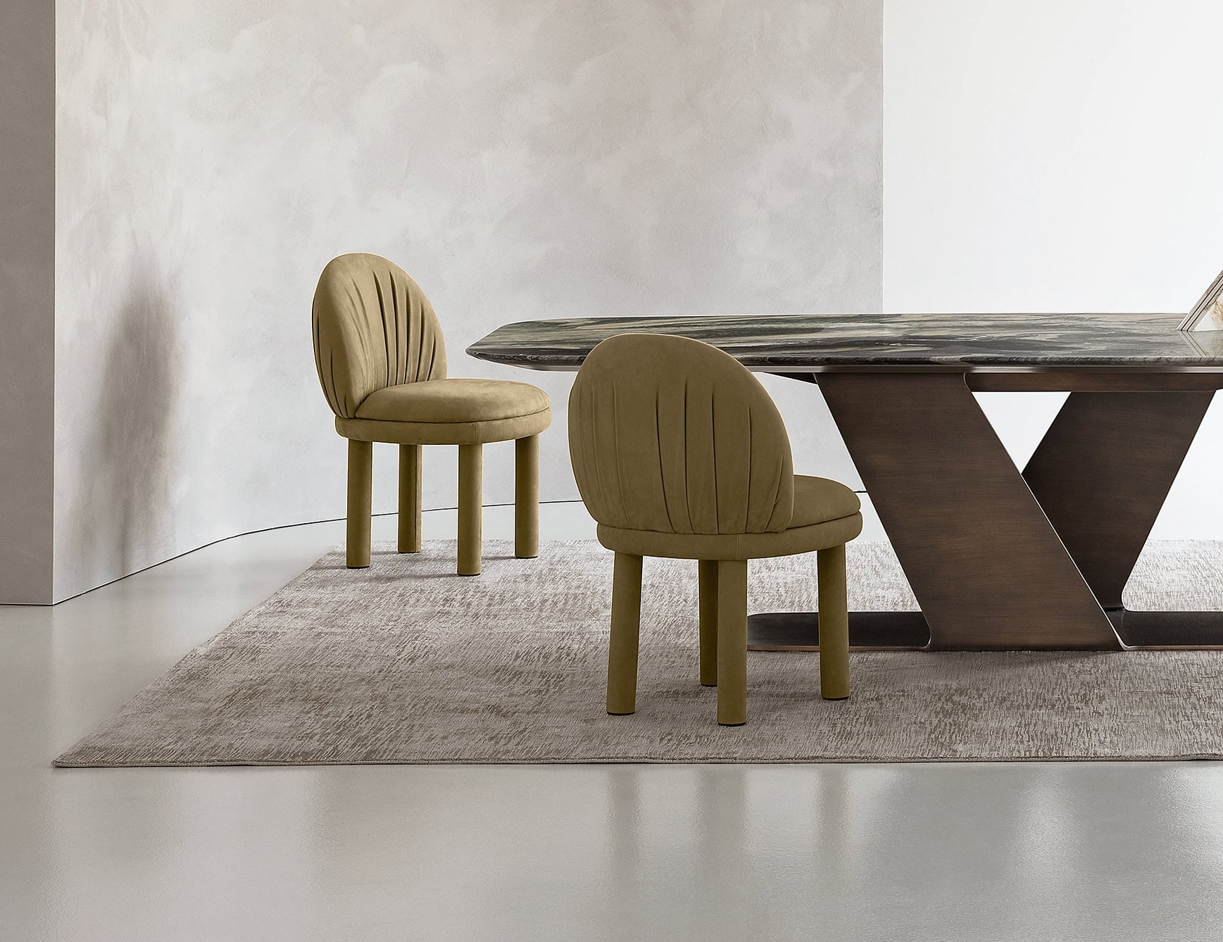 Fandango - Leather dining chairs with upholstered seats beside a table in a dining room setting