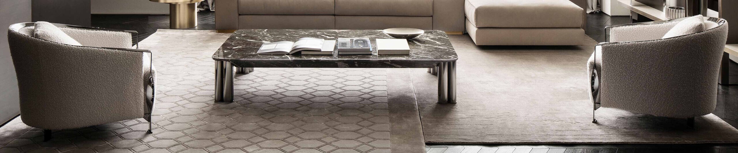 Rectangular marble coffee table with metal legs in living room setting