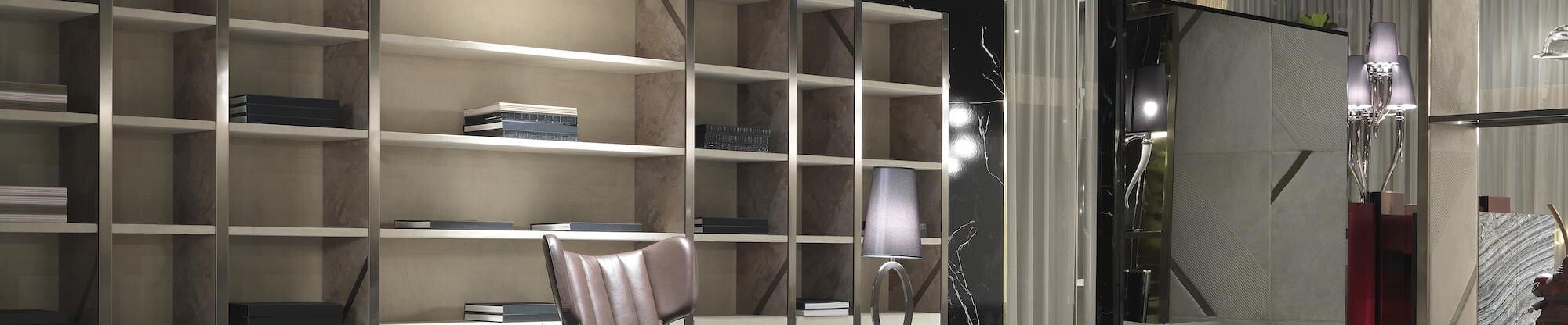 Wood and metal wall shelving unit with books in interior setting
