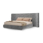 Fabric storage bed with large woven gray headboard and upholstered frame