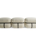 Bromptom three-seater fabric sofa with rounded cushions and black strap detail