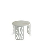 Round metal side table with cutout base design