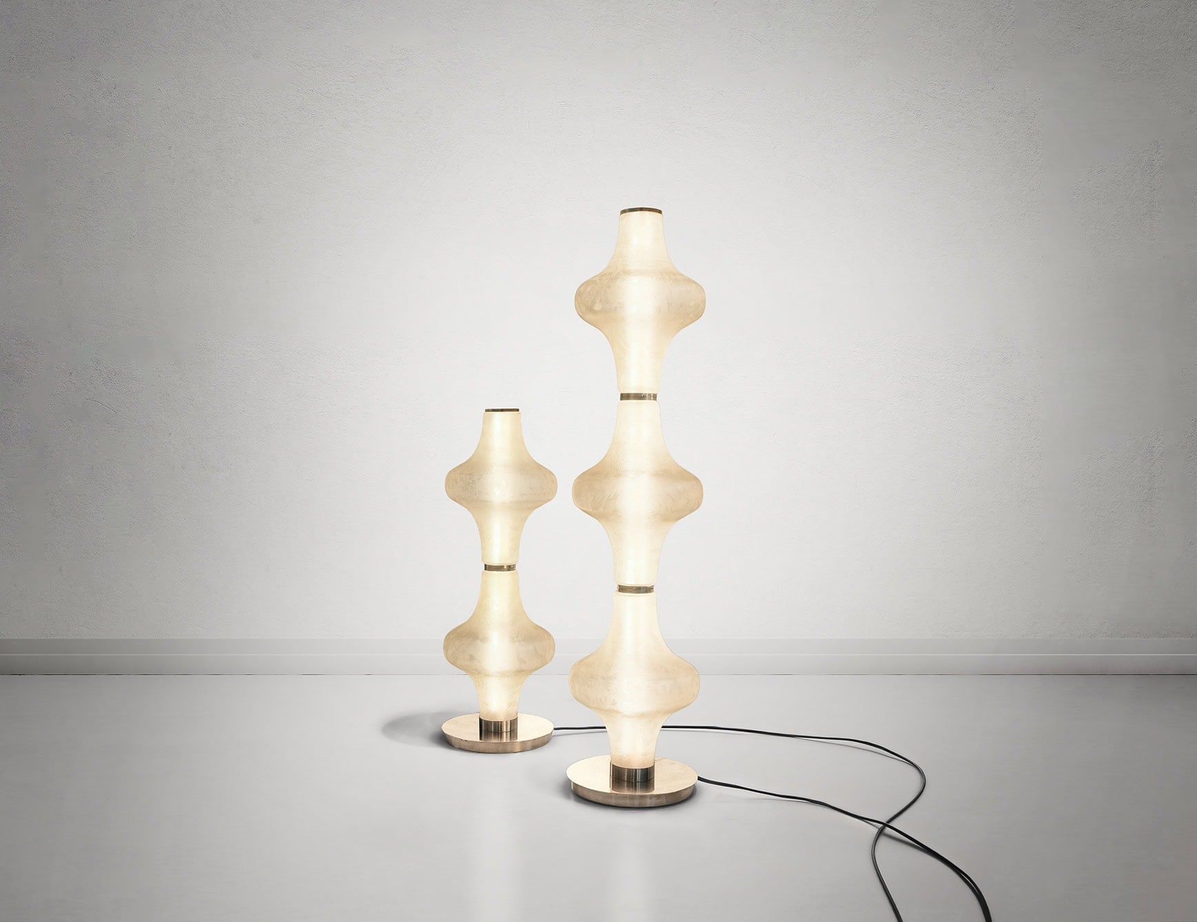 Murano glass floor lamps with sculpted shapes on round bases