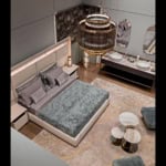 Leather storage bed with upholstered headboard in bedroom setting