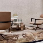 Upholstered leather office chairs with metal base in seating area