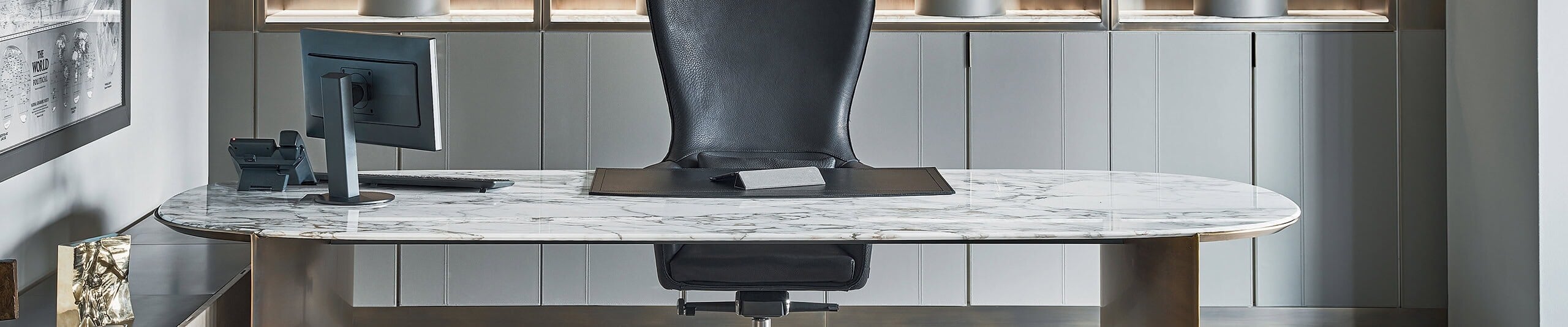 Marble top executive desk with metal base in office setting