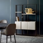 Leather bookcase with shelving and storage cabinet in living room setting
