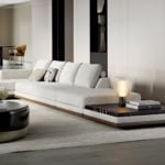 Fabric sectional sofa with low wooden base in living room setting