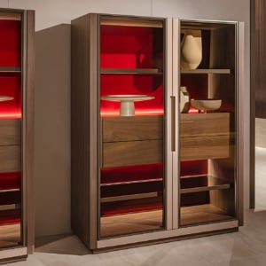 Wood credenza with glass doors and interior red paneling