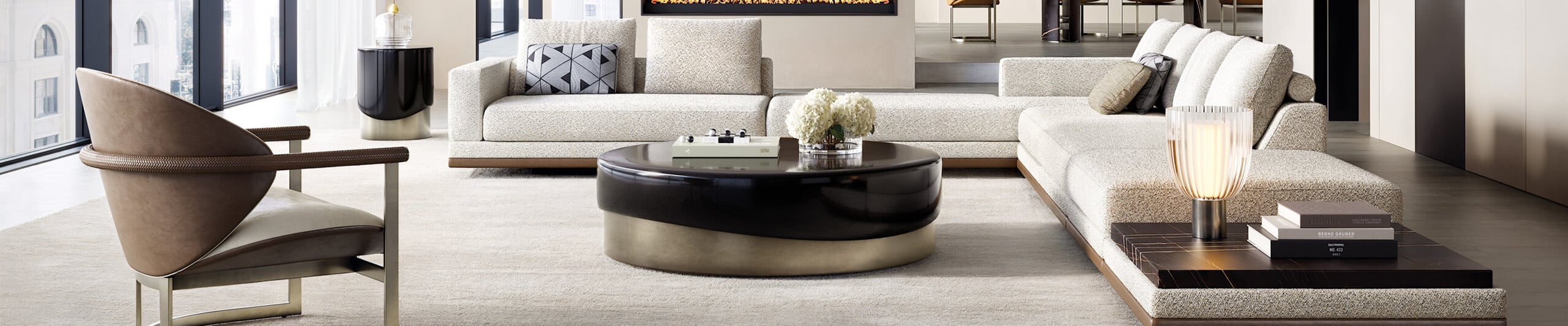 Fabric sectional sofa and round wood coffee table in living room