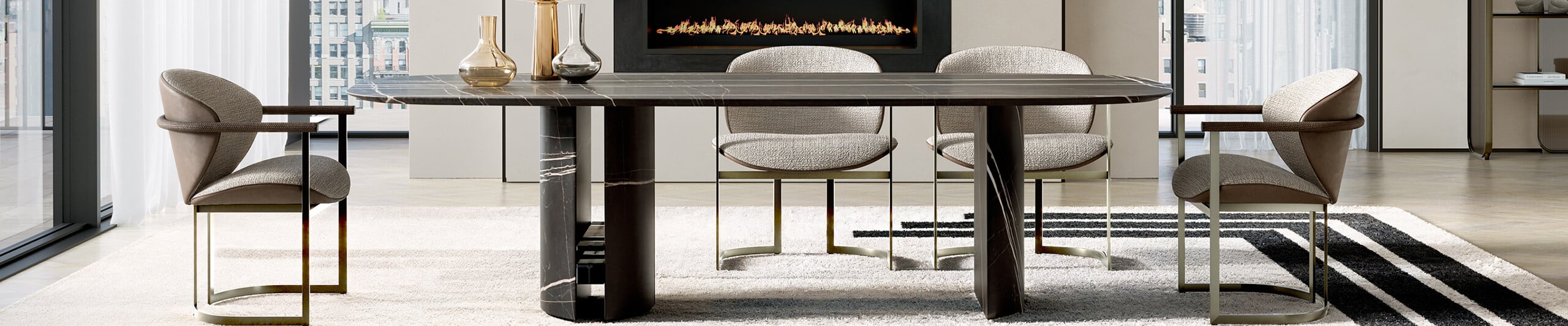 Upholstered dining chairs with metal frames around marble dining table