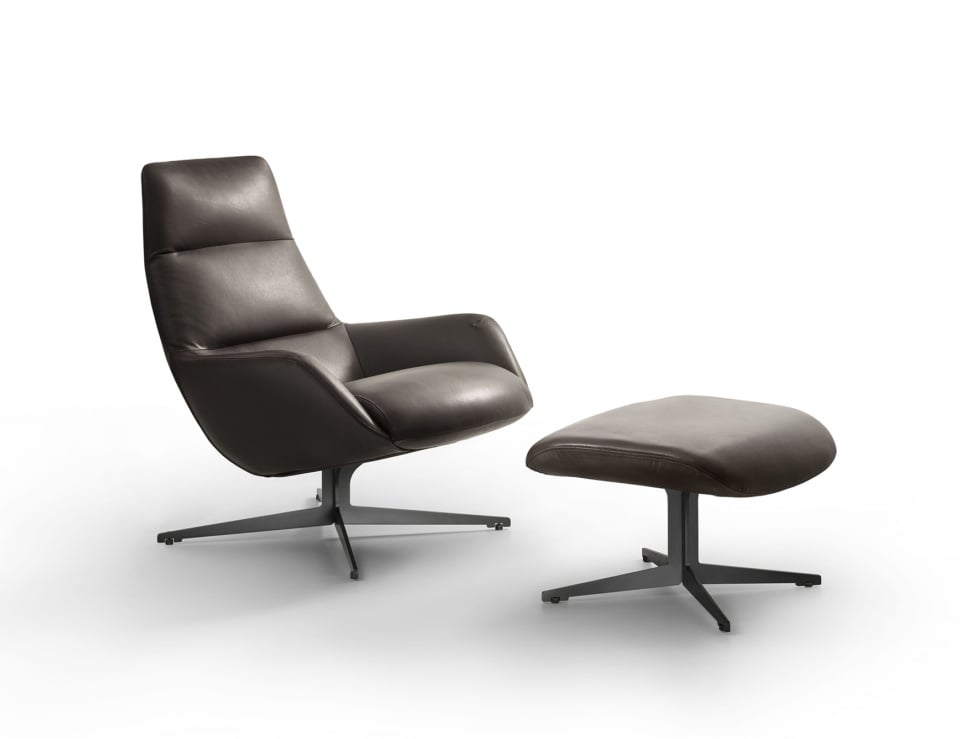Leather swivel office chair with matching ottoman on metal base