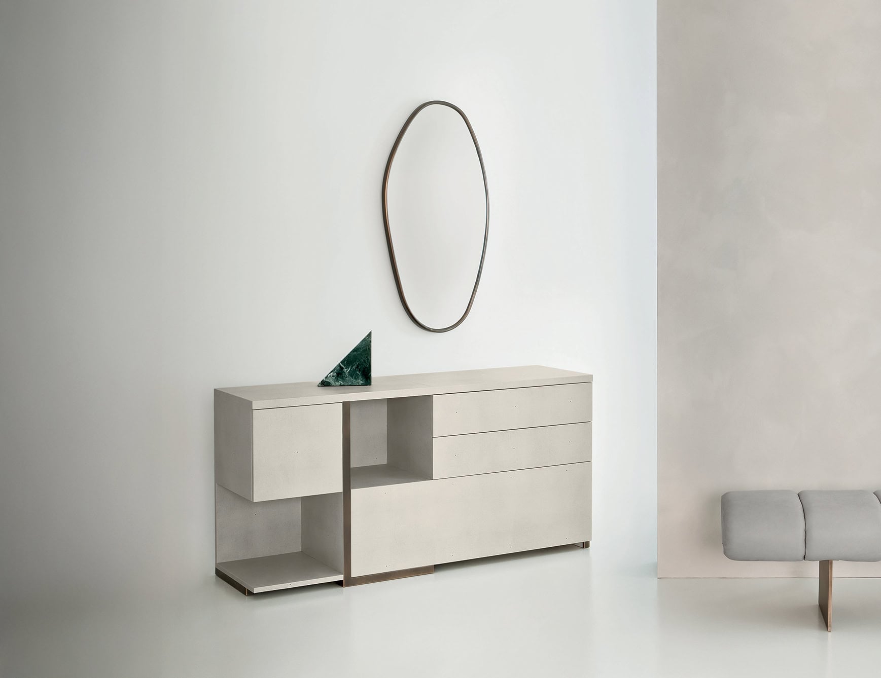 Leather chest of drawers with geometric design in bedroom setting