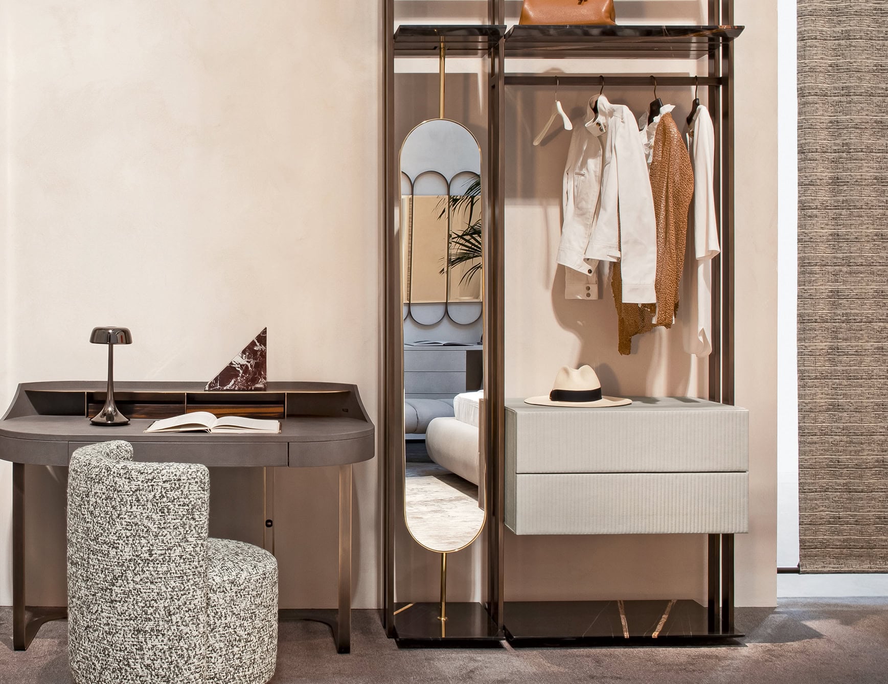 Metal framed wall mirror with integrated storage unit in a home interior