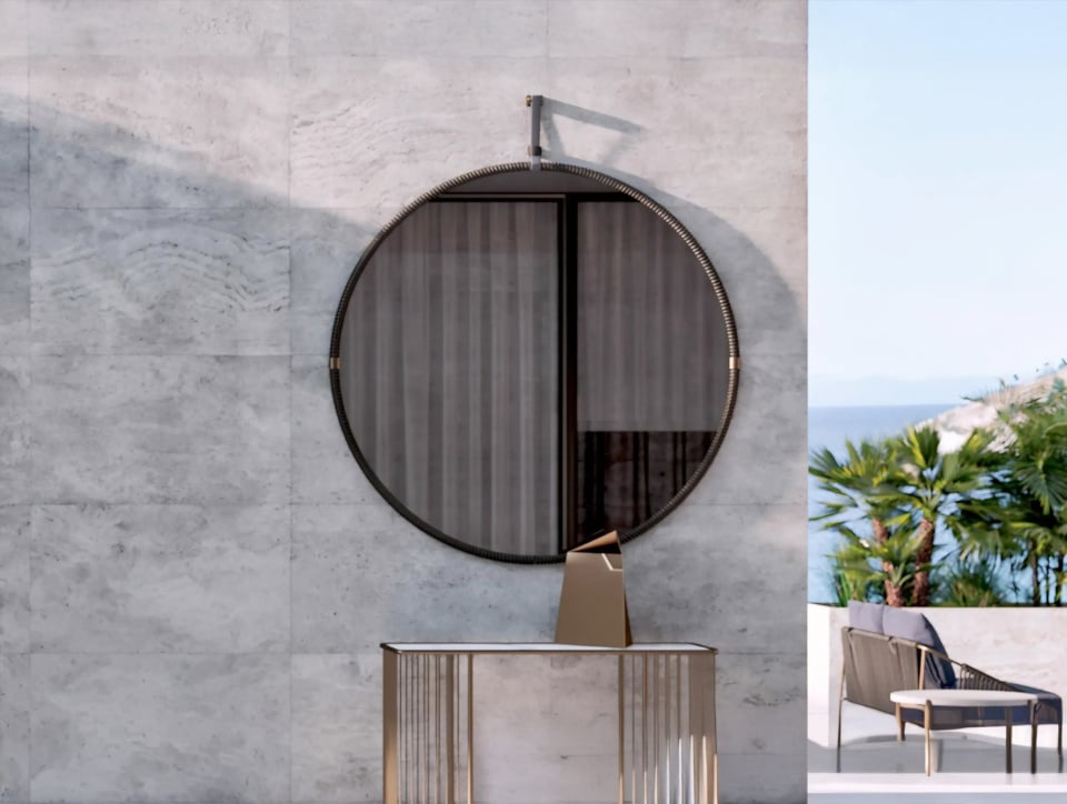 Modern outdoor patio with circular mirror