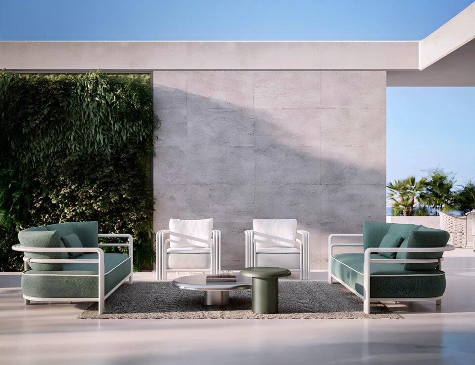 Capri fabric outdoor armchair with white frame on patio