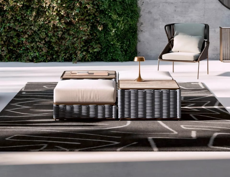 Modern outdoor patio with seating and greenery