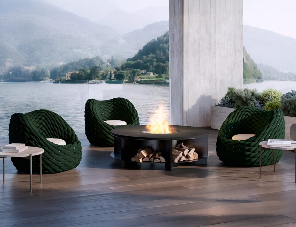 Outdoor fabric swivel armchairs with woven design near fire pit