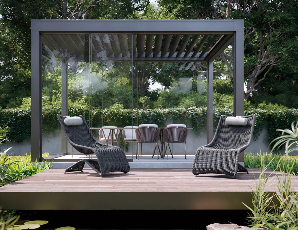 Outdoor fabric lounge chairs with woven finish on wooden deck