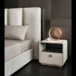 Leather storage bed with upholstered headboard