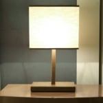 Leather table lamp with rectangular shade on side table