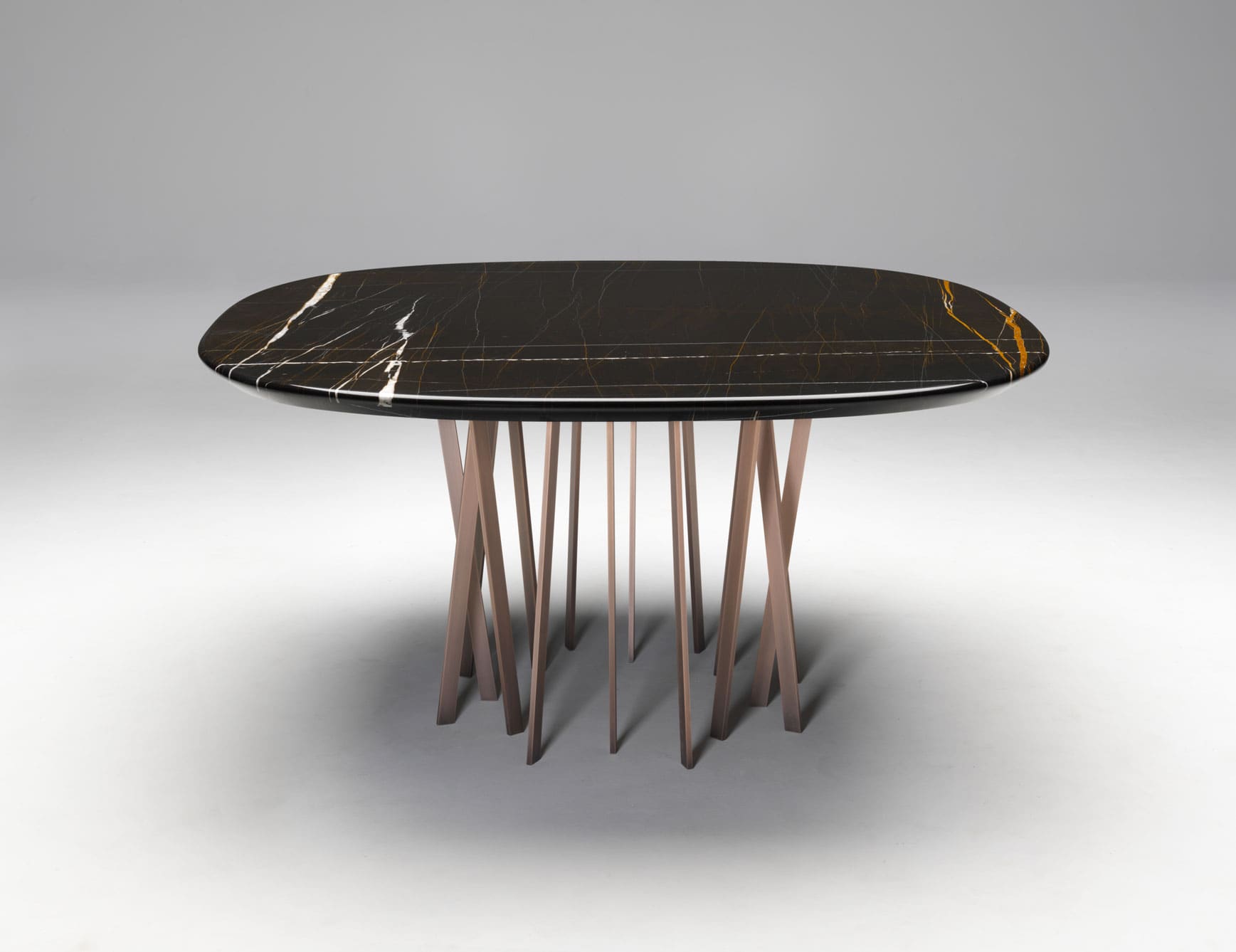 For Hall Table - Oval marble dining table with Sahara Noir finish and metal base