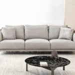 Three-seater leather sofa with metal frame