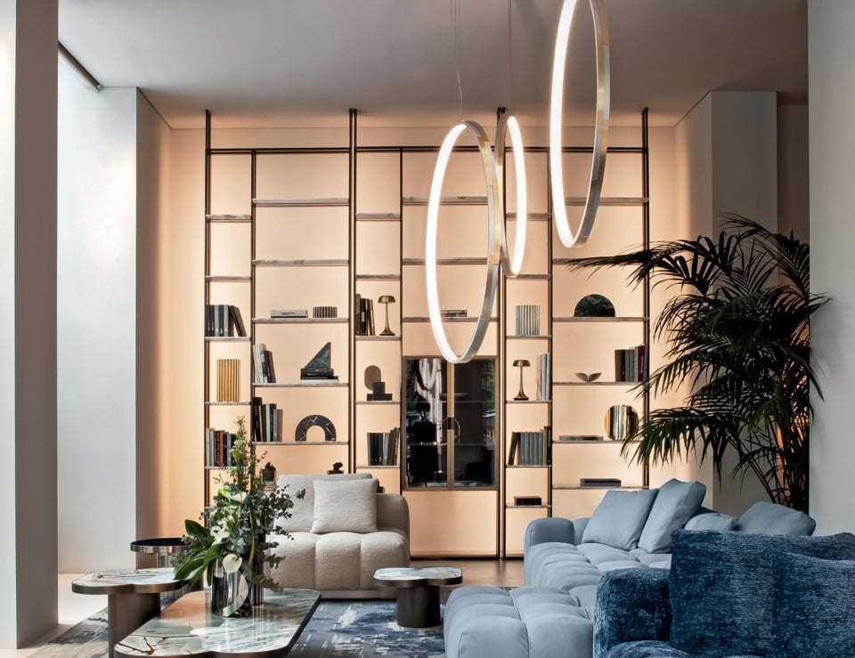Leather bookcase with glass shelving and metal frame