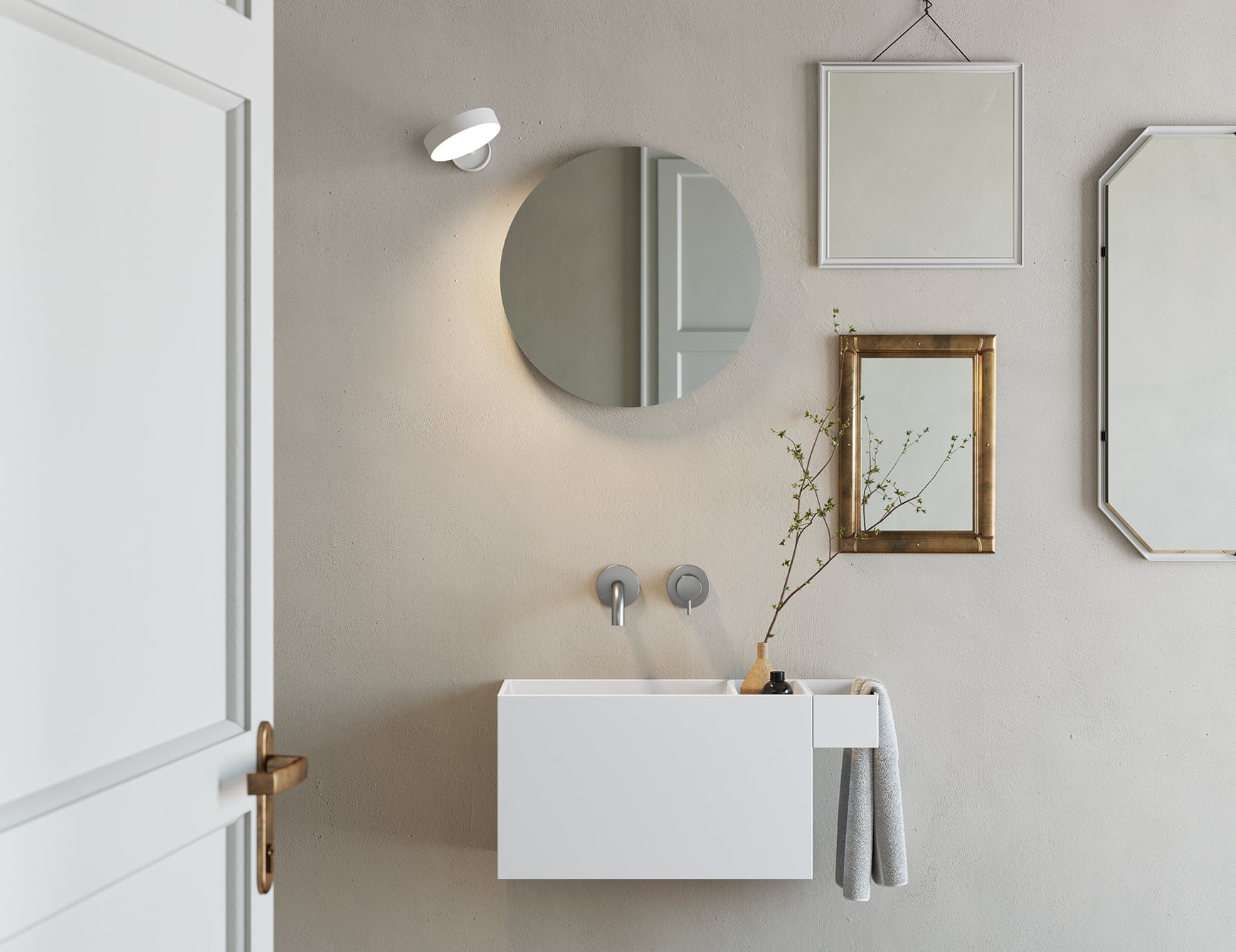 White resin washbasin in bathroom setting.